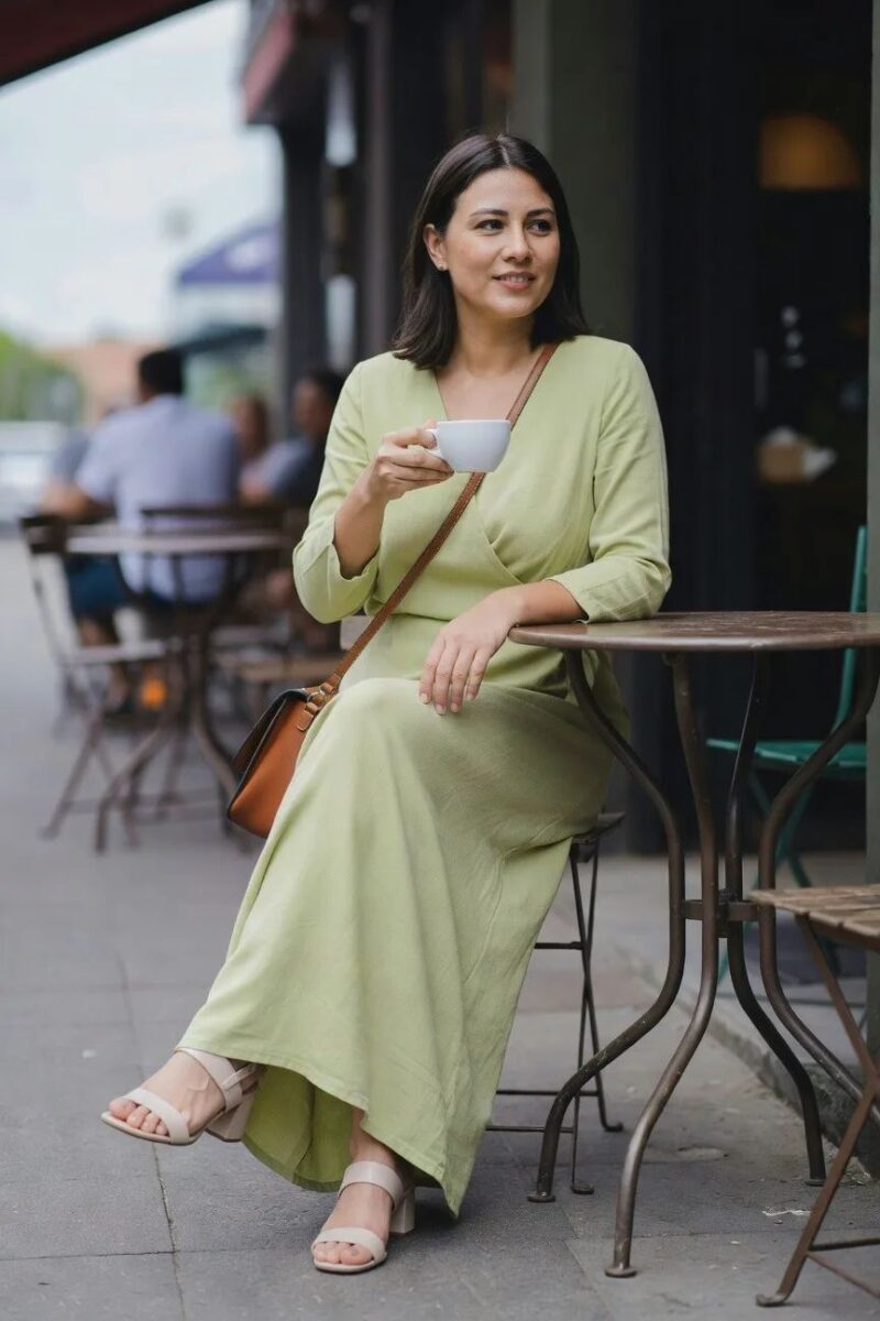 green maxi dress with crossbody bag