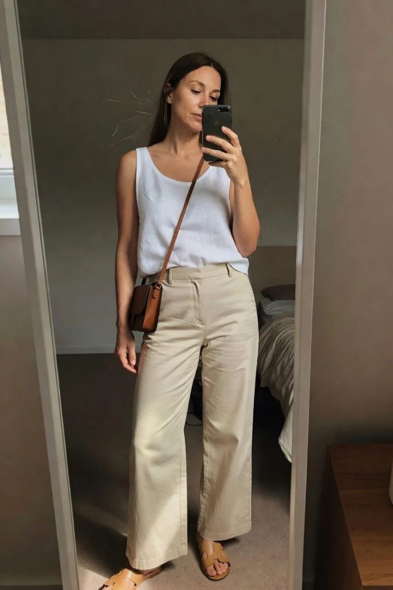 white tank paired with beige wide leg pants
