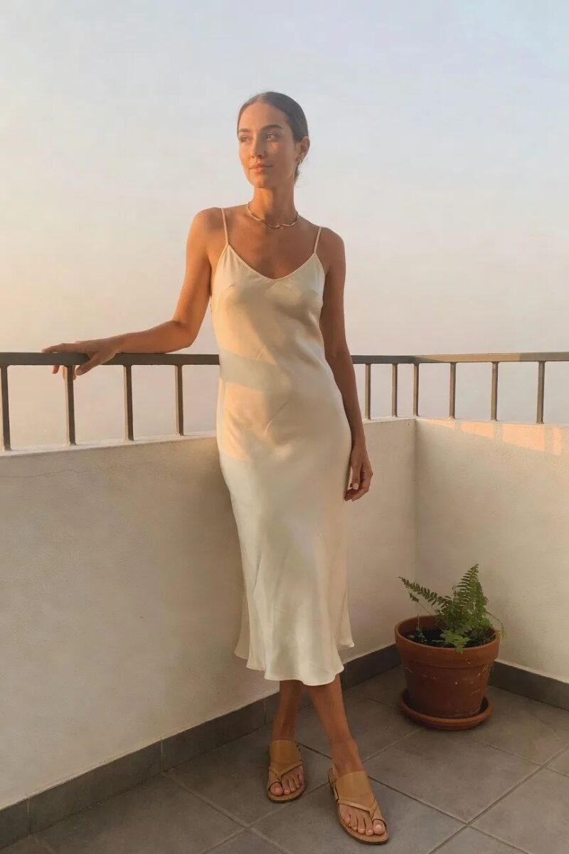 cream slip dress with flat neutral sandals