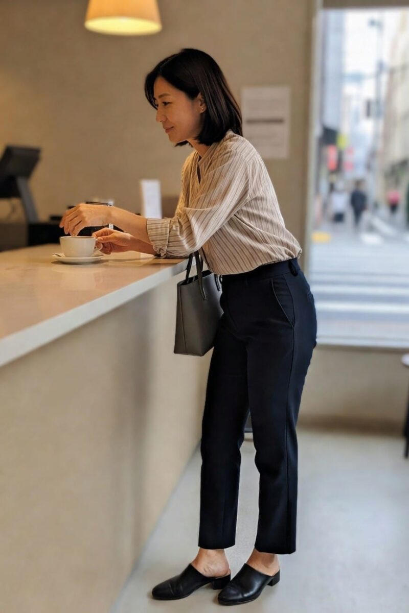 striped blouse with black cropped pants