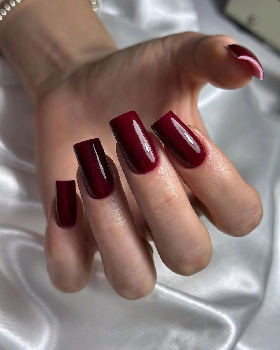 Medium burgundy square coffin nails in a solid glossy finish