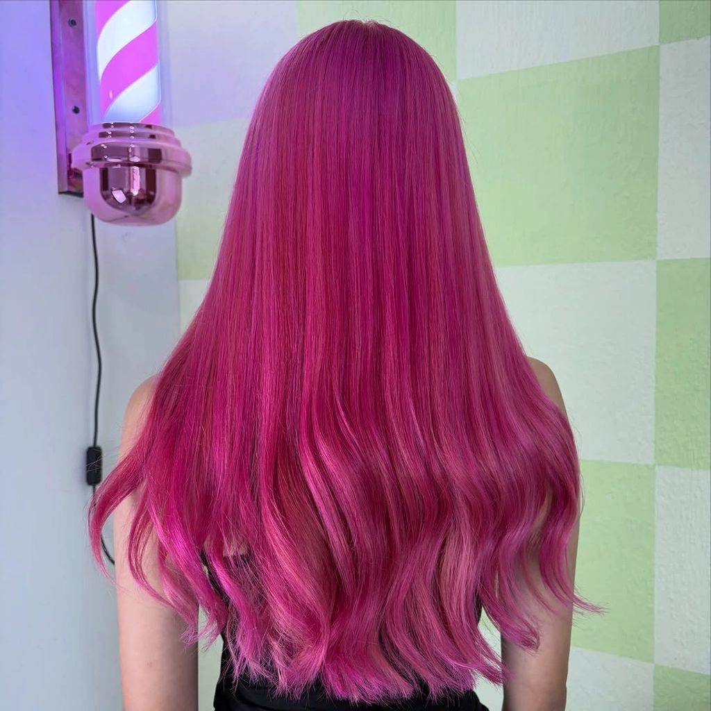 Long vivid magenta hair with soft waves through the ends | Gorgeous September Hair Colour Ideas for a Fresh Autumn Refresh