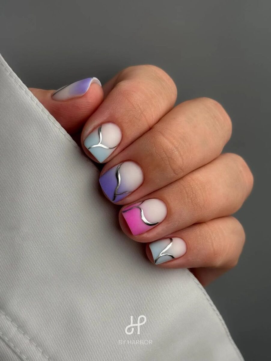 Short lavender square nails with soft white abstract accents