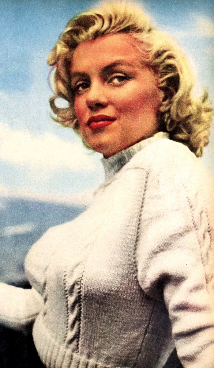 1953 magazine scan of Marilyn Monroe wearing a white cable-knit turtleneck sweater