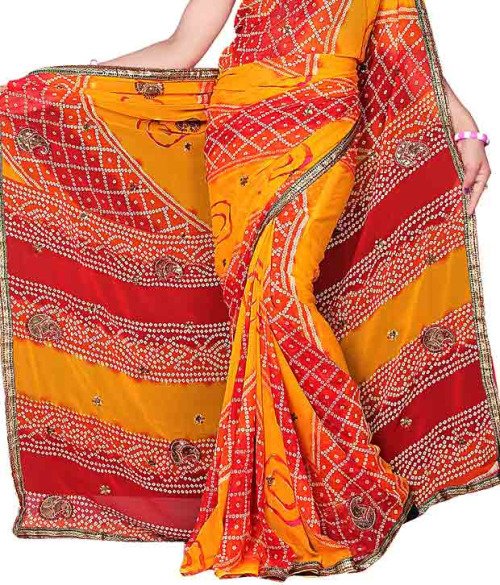 Orange and red bandhani print saree with tie-dye dots and woven border